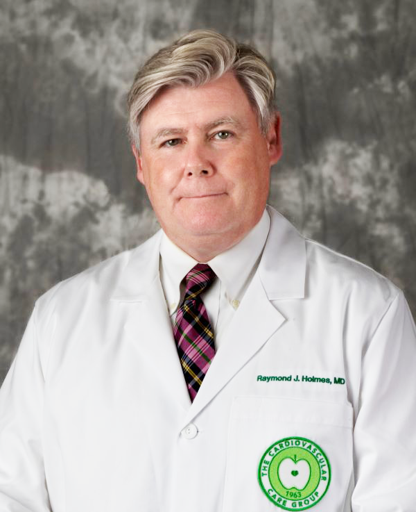 A portrait of a person wearing a white medical coat